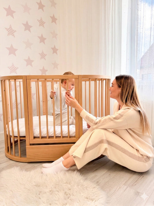 Round OLIN baby crib in beech, natural